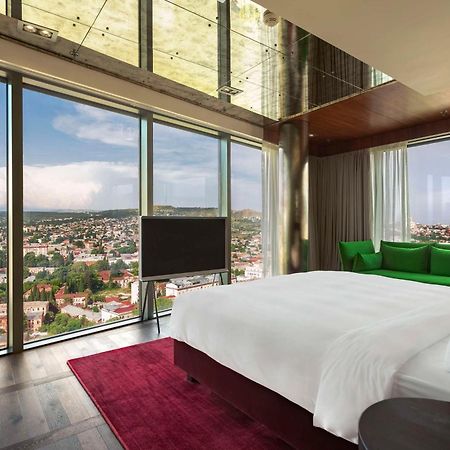 Radisson Blu Iveria Hotel Тбилиси Екстериор снимка A room at the hotel