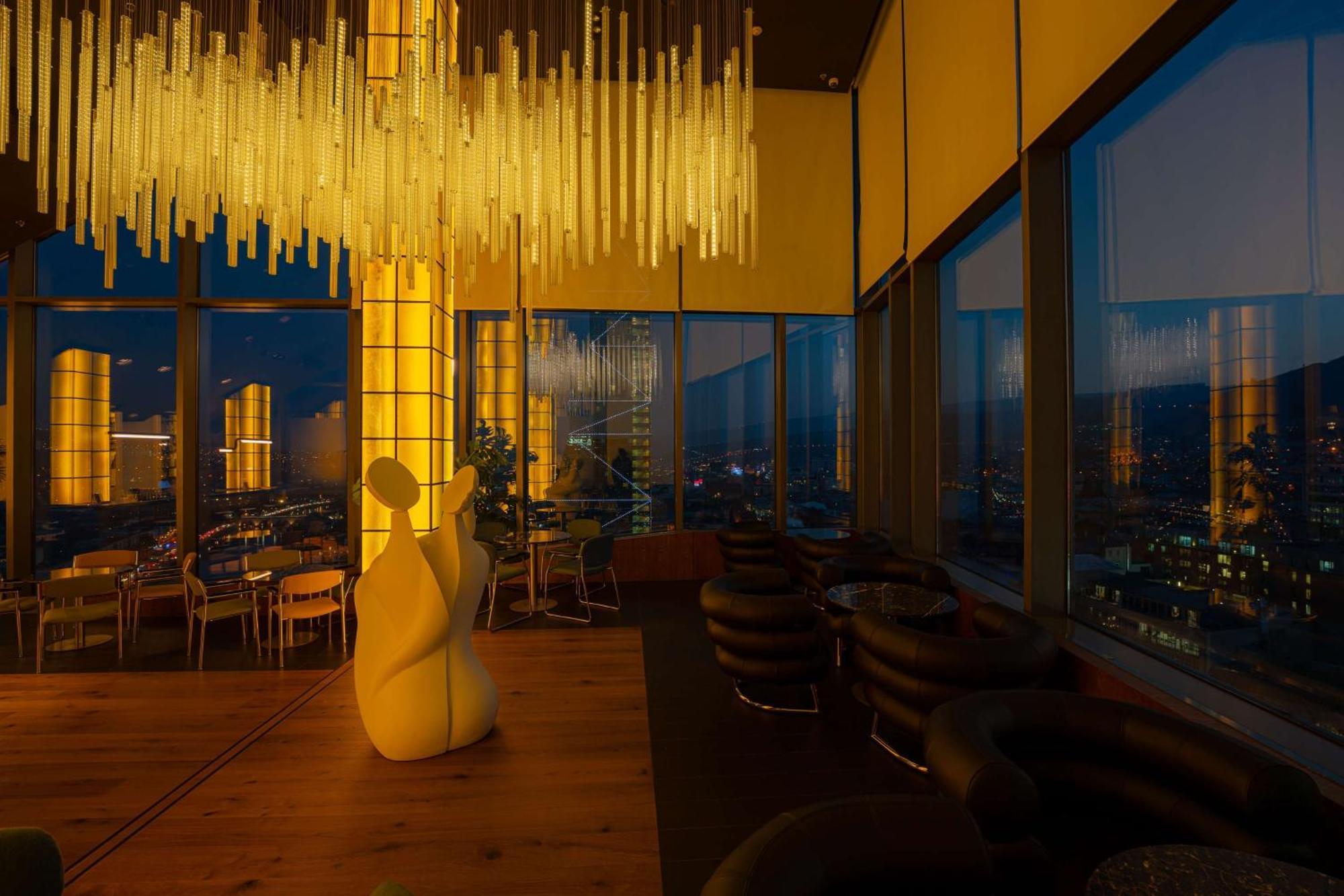 Radisson Blu Iveria Hotel Тбилиси Екстериор снимка The interior of the restaurant